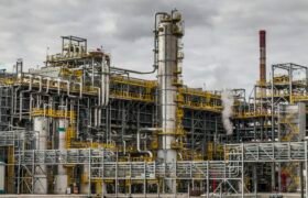 Oil Refinery factory at the cloudy sky, petrochemical plant, Petroleum